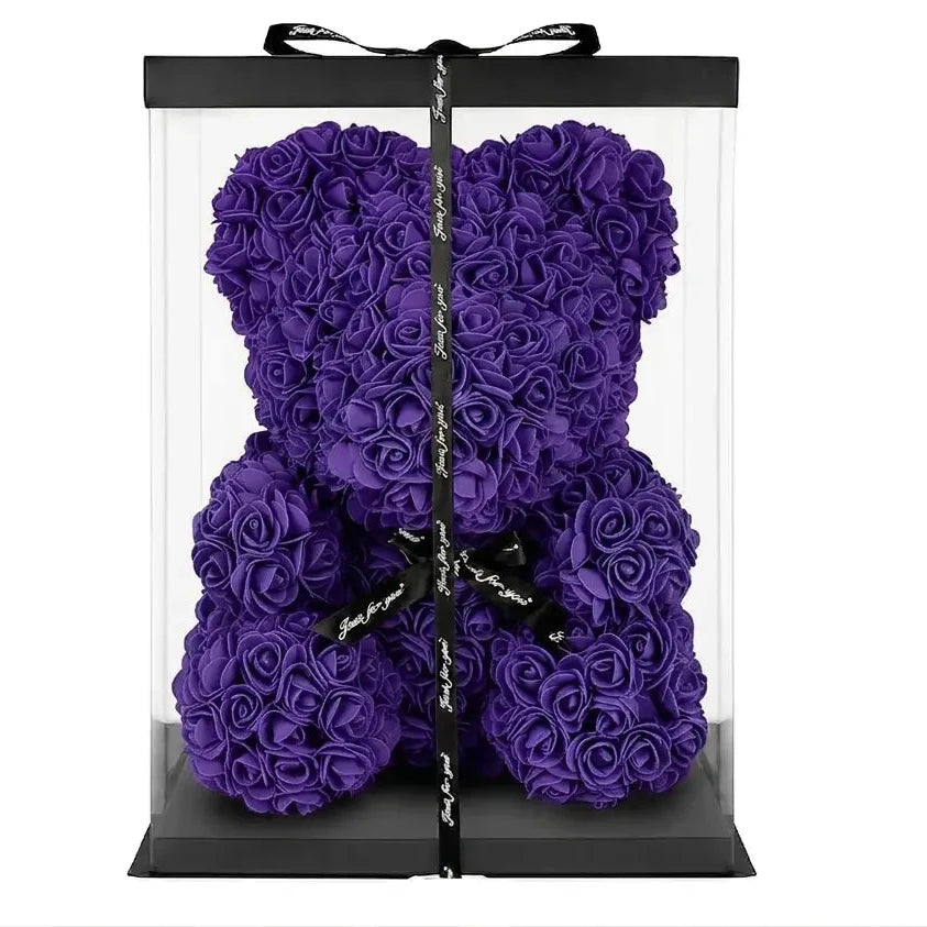 A large blue rose teddy bear gift box with a clear acrylic body, black base, black lid, and a black ribbon bow, shown on a plain white background.