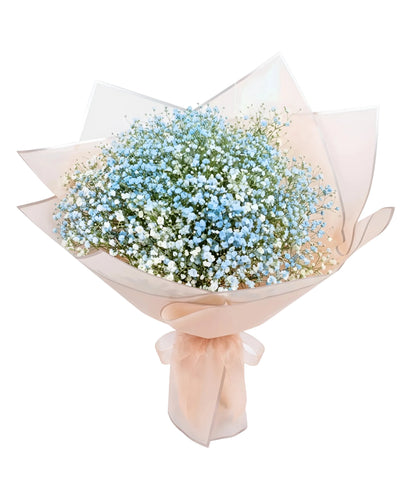 Bouquet of light blue flowers wrapped in white paper on a white background