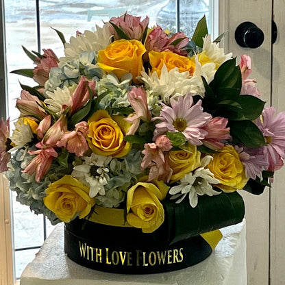 Colourful flower arrangement in a box in Aurora Ontario